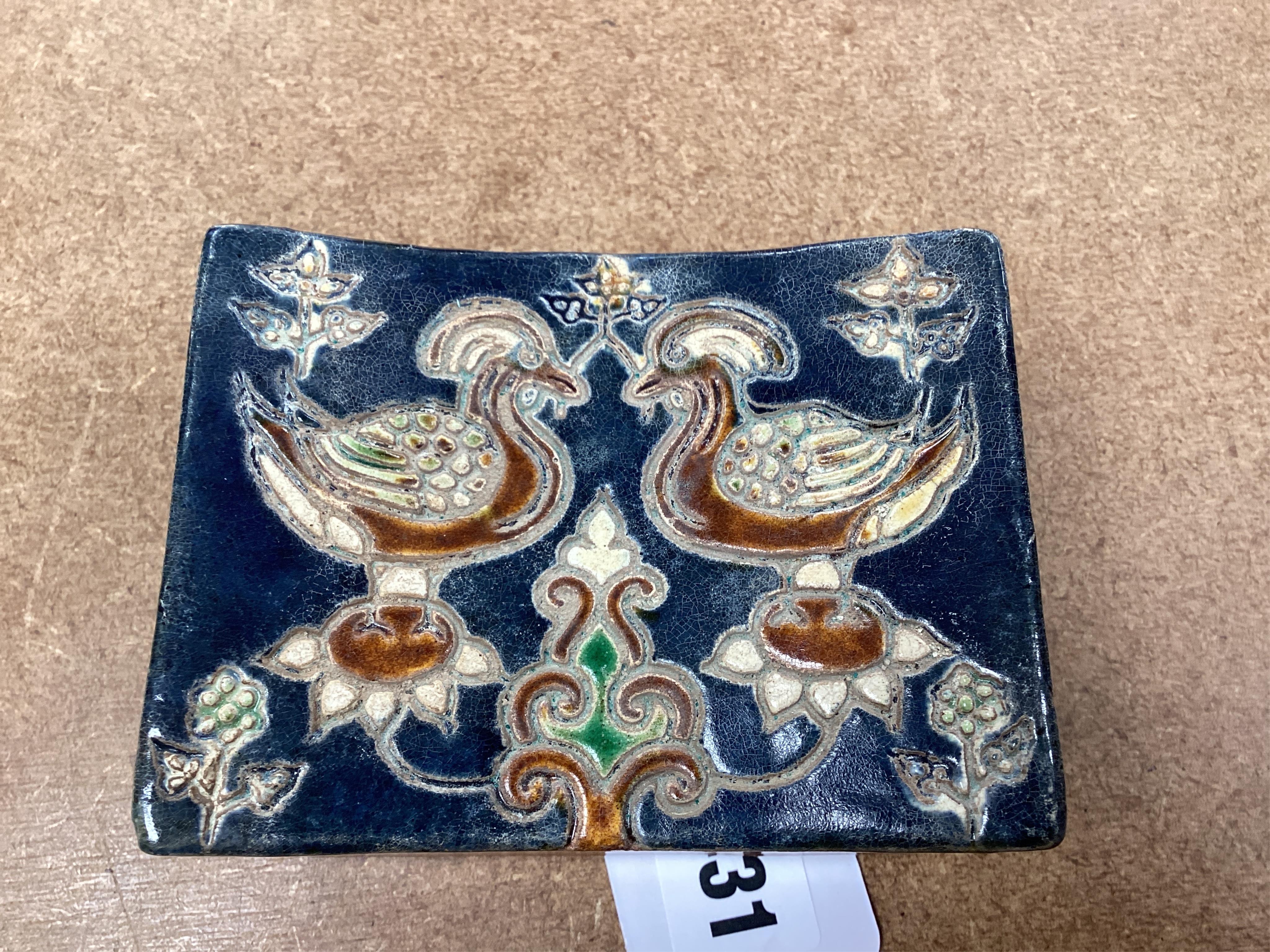 A Chinese stone ware arm rest, 10cm wide